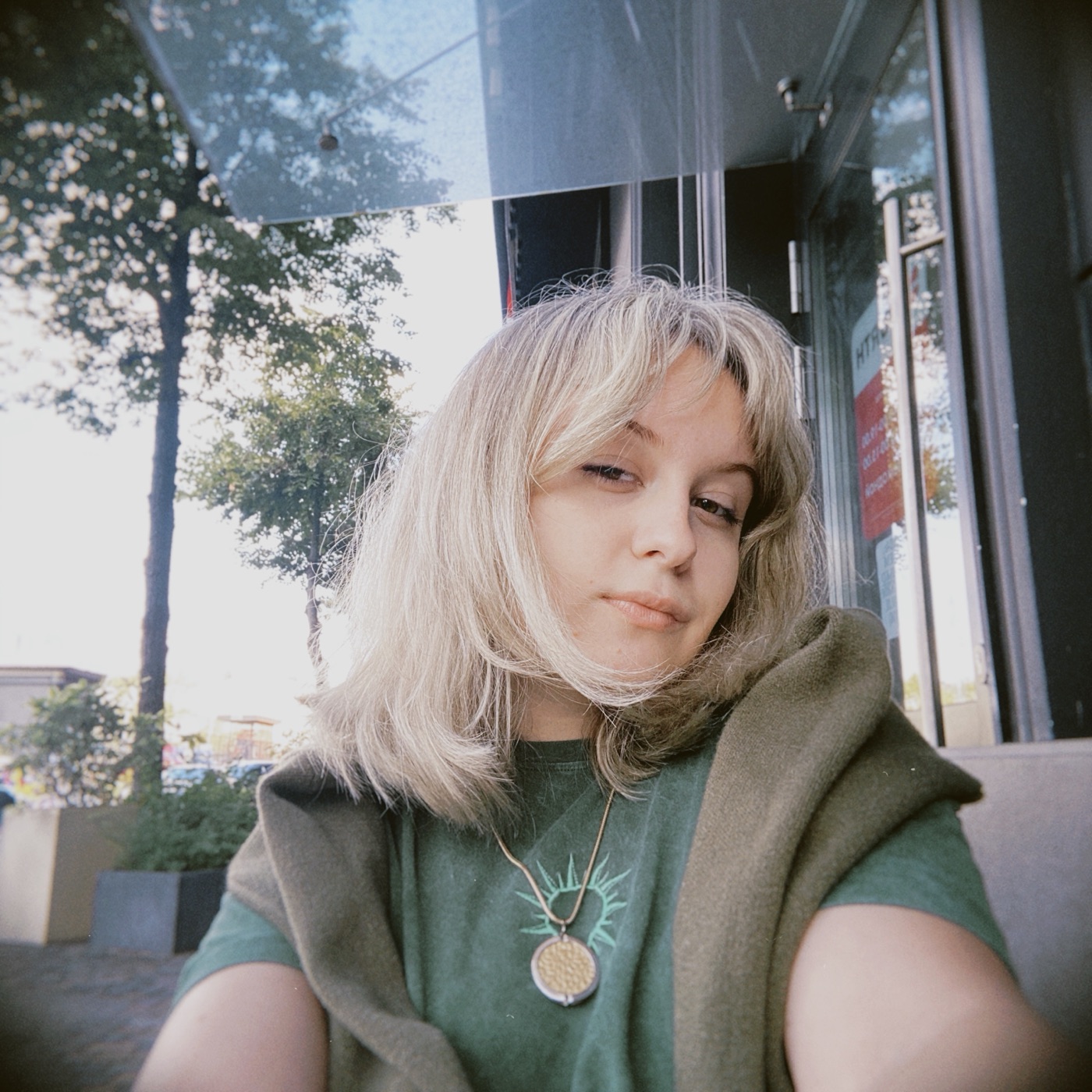Self portrait — Kate at a café
